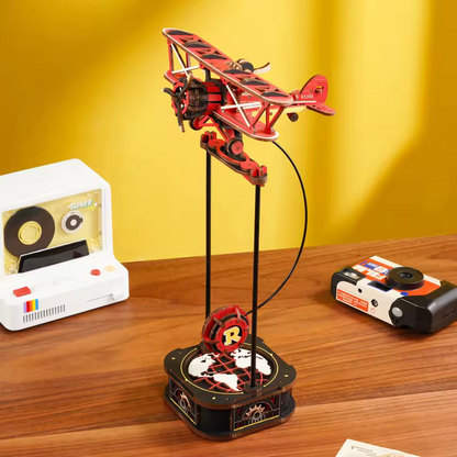 Maquette mécanique en bois - aviateur