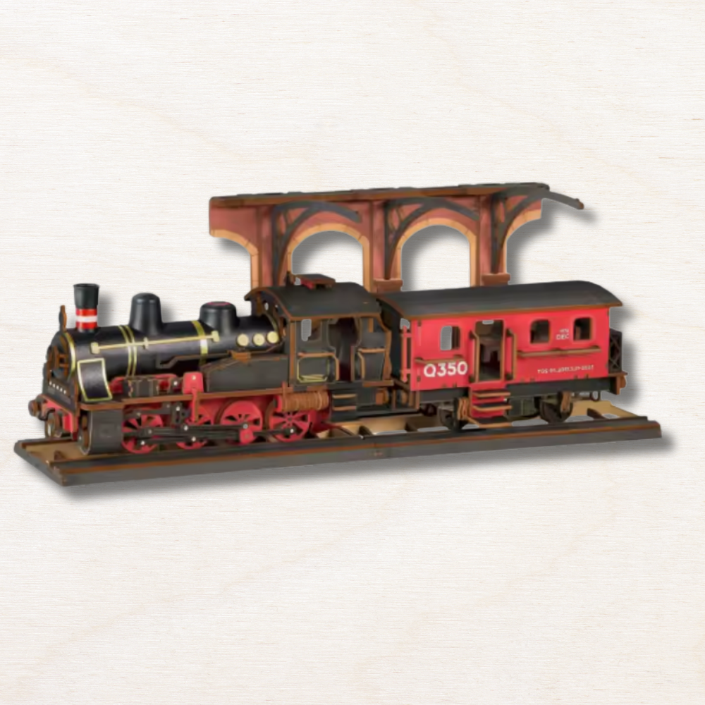 maquette en bois en forme de train à vapeur noir et rouge 