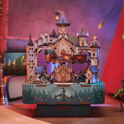 boite à musique en forme de maquette en bois d'un chateau magique digne d'harry potter
