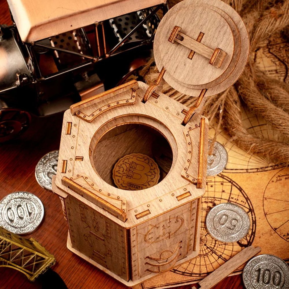 boîte casse-tête bois gravé engrenages pièce or secret mécanisme