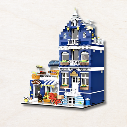 un jeu de construction bleu en forme d'hotel
